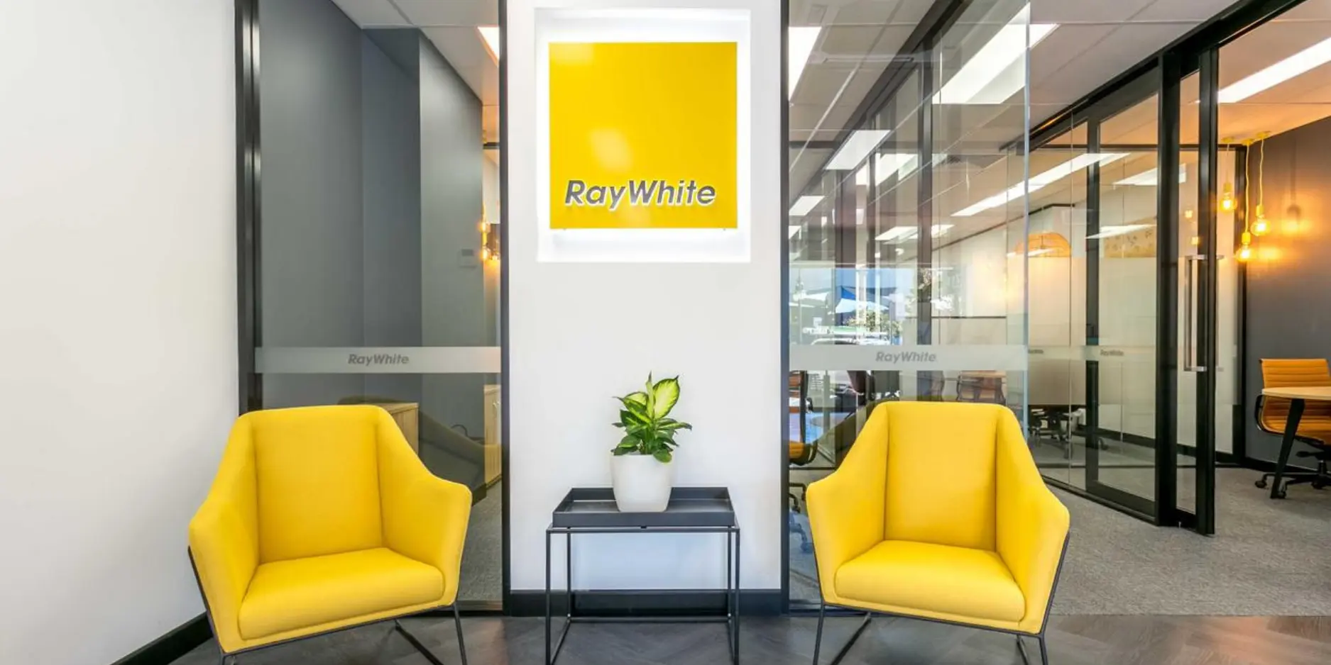 Raywhite Indoor Illuminated signage in Westgate Auckland. Indoor Signage Auckland