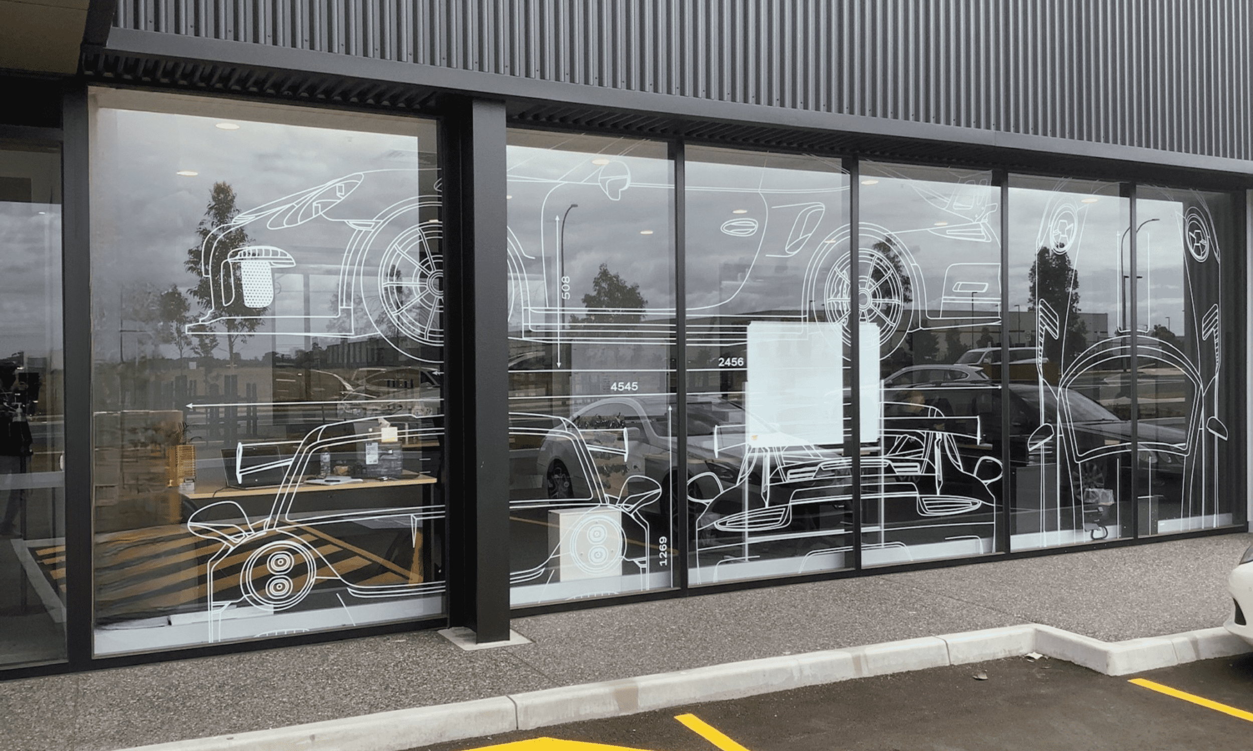 custom graphic design car dealer window signage